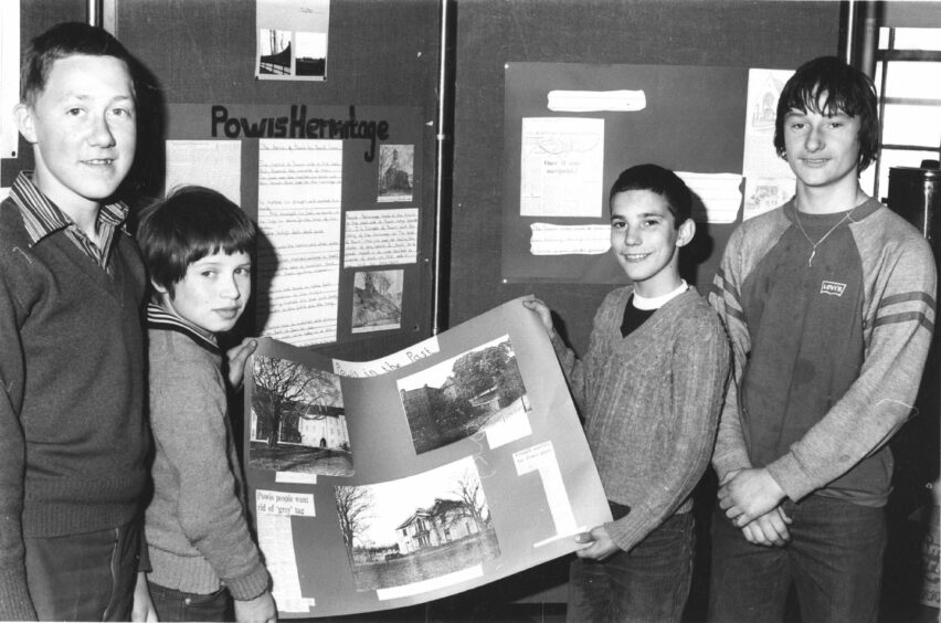 April 24 1981 -Leonard Patterson, David Morrison, Stephen Reid and Patrick Judge of Powis Academy pose with photographs they took of the area during their Easter holidays. 