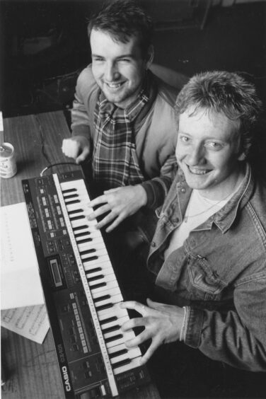 February 14 1988 All smiles as Phil Robertson and Fred Perry find the key to success on the electronic organ at the Powis workshop.