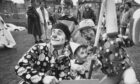 1989 - The Clown Jewels from Invergordon with John McGeoch (left) and David Smith (right) with young assistant Lee Hicks at the Powis Community Festival.