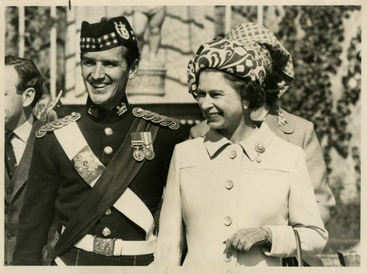 Queen Elizabeth II and Captain Michael Tait