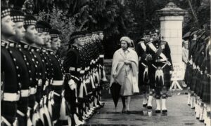 1980 - The rain stayed off, ensuring the Her Majesty stayed dry while inspecting the Royal Guard at Balmoral.