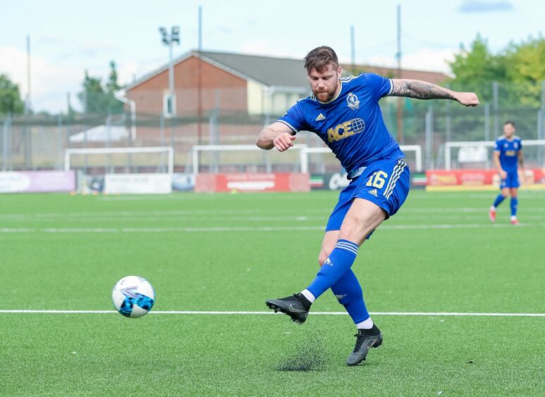 Cove Rangers midfielder Iain Vigurs takes aim