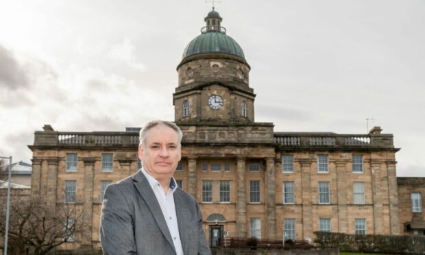 MSP Richard Lochhead, pictured outside Dr Gray's Hospital.