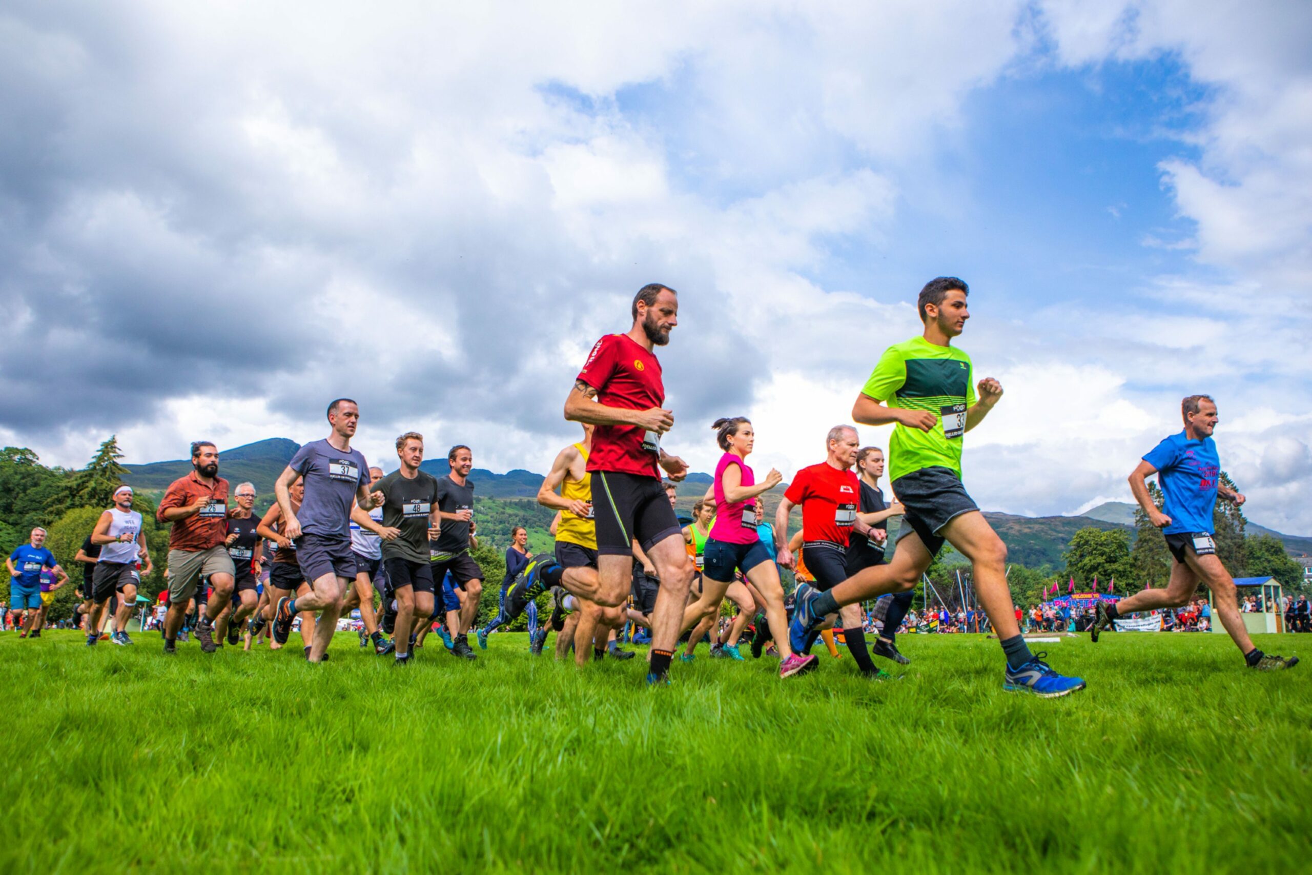 Men participating in a hill race. 