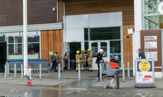 Staff and shoppers were evacuated from the store around 3.30pm as parts of the store's roof caved in. Picture by Brian Smith