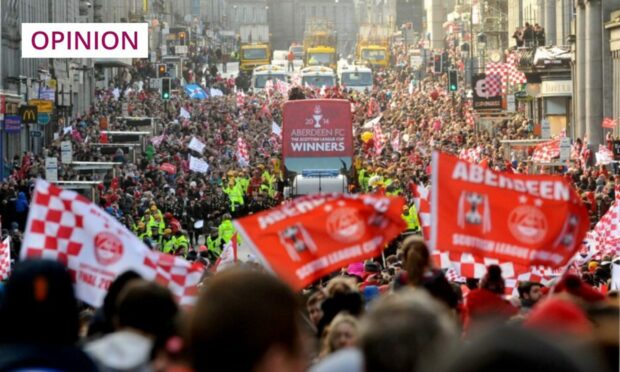 Aberdeen FC's open top bus parade down Union Street with the Scottish League Cup in 2014 (Photo: Richard Frew)
