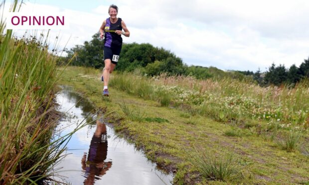 A runner takes part in Stonehaven Running Club's Houff of Ury five-mile hill race, which takes place alongside Stonehaven Highland Games (Photo: Kami Thomson/DC Thomson)