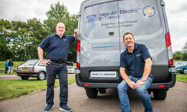 Mark Wilkie and TrustFord regional director Glen Kenington with the new E-Transit. Picture by Wullie Marr