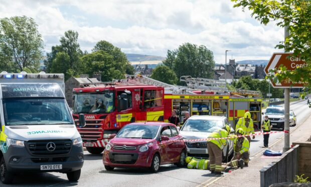Emergency services were at the scene of the crash in Elgin. Picture by JasperImage.