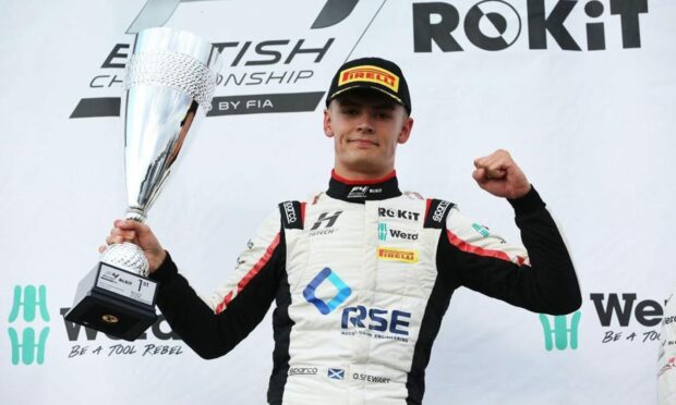 Beauly's Oliver Stewart with his trophy after winning at the F4 British Championship event at Thruxton in 2022.