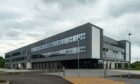 Elgin High School, completed in 2018, is one of a dozen schools in Moray found to have the cladding. Picture by Jason Hedges.