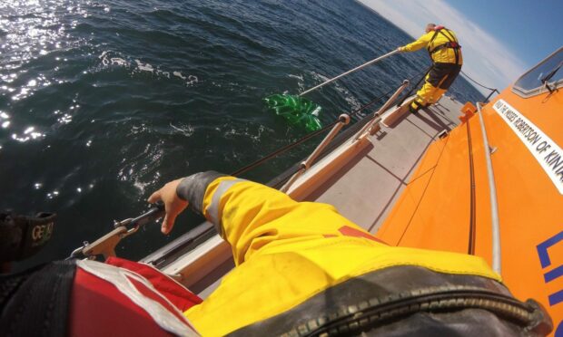 Volunteer crews from Peterhead spotted a green inflatable in the water. Picture: RNLI.