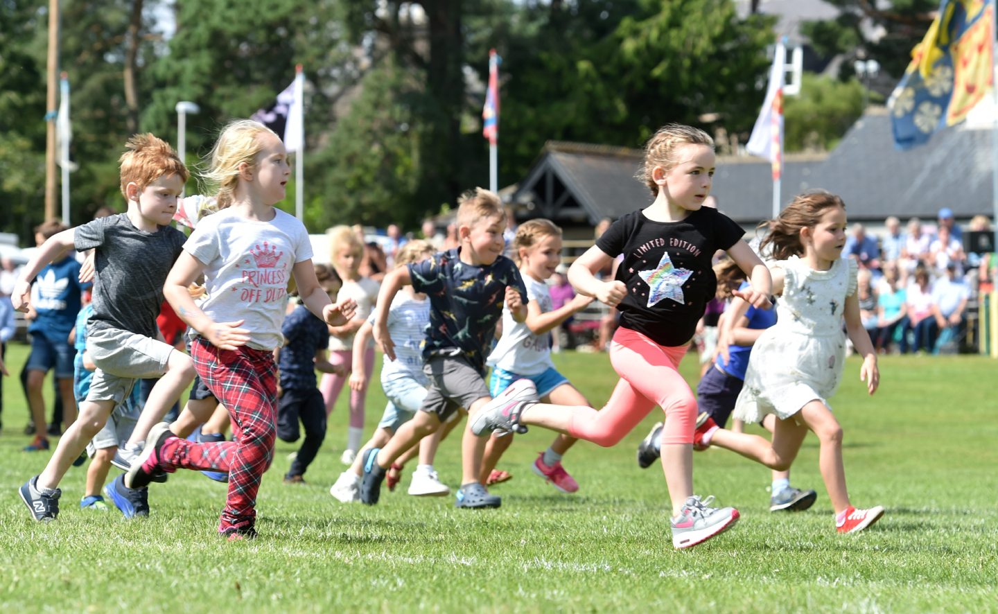 Children taking part in a Highland games race.