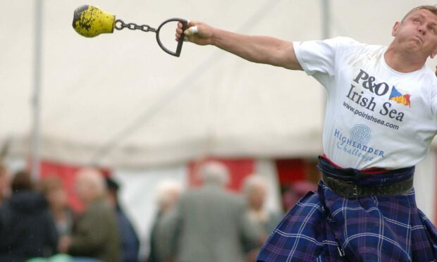 Neil Elliot competing in the heavy events at the Oban Games.