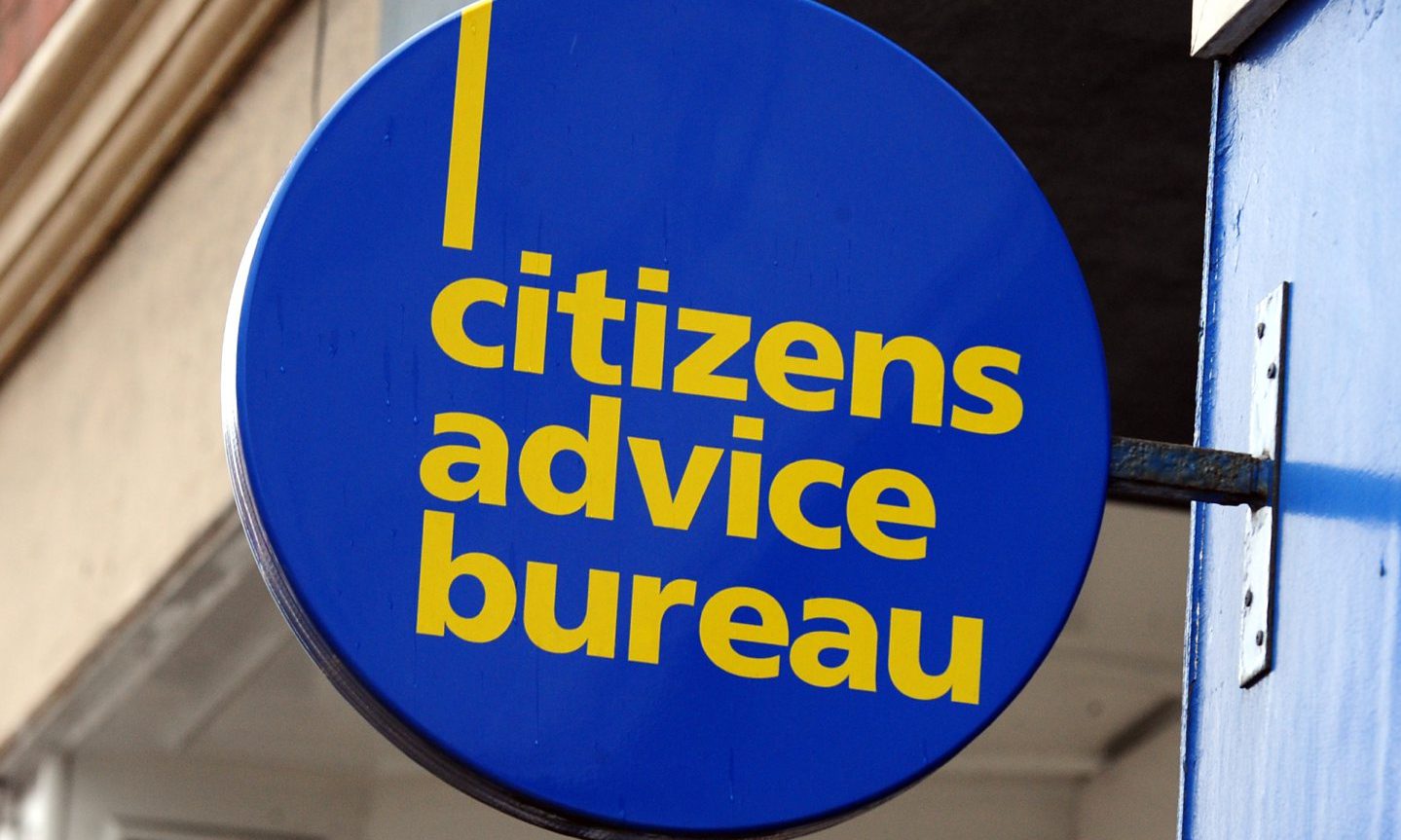 Blue circular Citizens Advice Bureau sign. 
