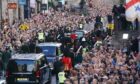 Huge crowds packed the Royal Mile when the Queen was moved to St Giles Cathedral. Image: Shutterstock.