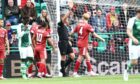 Liam Scales (4) of Aberdeen is sent off against Hibs at Easter Road.