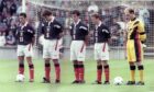 The Scotland players take a moment to remember Princess Diana before the match got under way.