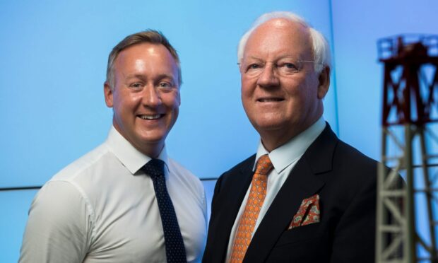 Douglas Hay, ADC Energy's founder, chairman and managing director, right, with his son and fellow director Austin Hay.