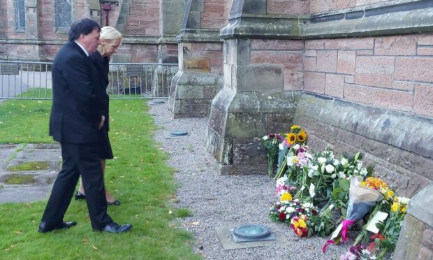 Councillor Ken Gowans was accompanied by chief executive Donna Manson as he laid a wreath at the Garden of Remembrance at Inverness Cathedral in honour of the Queen.