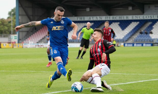 Cove Rangers defender Scott Ross in action against Caley Thistle