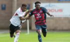 Kazeem Olaigbe in action for Ross County against Aberdeen. Image: SNS