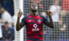 Ross County's William Akio celebrates after scoring his late equaliser against Aberdeen.