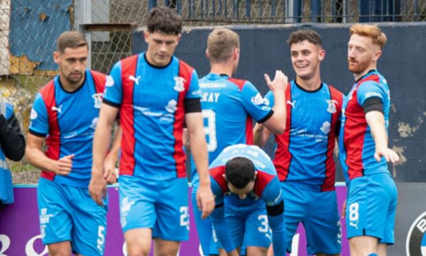 Cameron Harper (second from right) celebrates after equalising for ICT at Dundee.