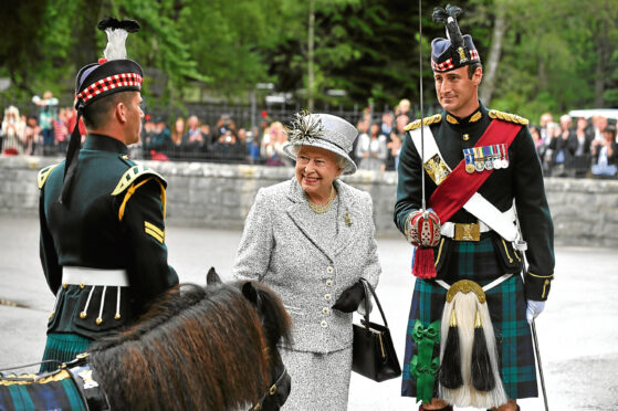 The Queen Elizabeth II at Balmoral with the Guard of Honour.
Photo by Mark Owens