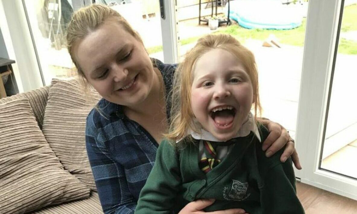 Lauren Clark with daughter Lola, who has Cerebral Palsy, at home in Elgin