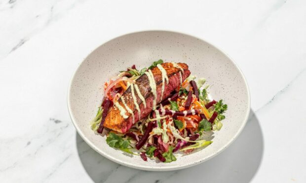 Baxters beetroot and lime-marinaded salmon with Asian slaw and coriander yoghurt.