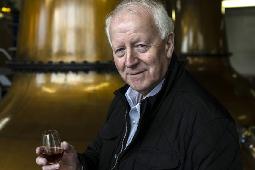Billy Walker with a glass of whisky