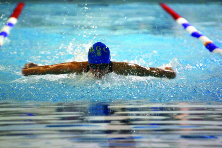 an RGC student swims as part of extra-curricular activities in school