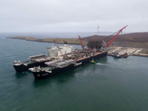 Ninian Northern jacket – the latest decommissioning project at Dales Voe, Lerwick, at load-in from Pioneering Spirit.