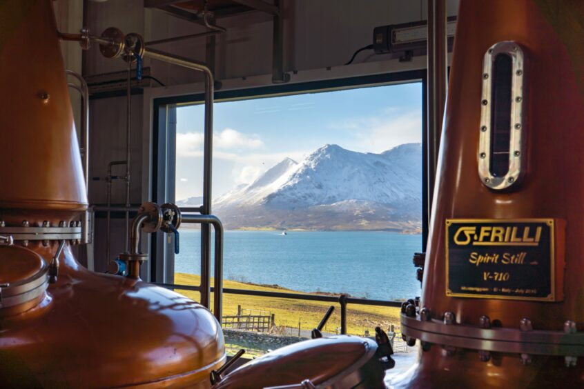 Copper stills in winter looking out to mountains.