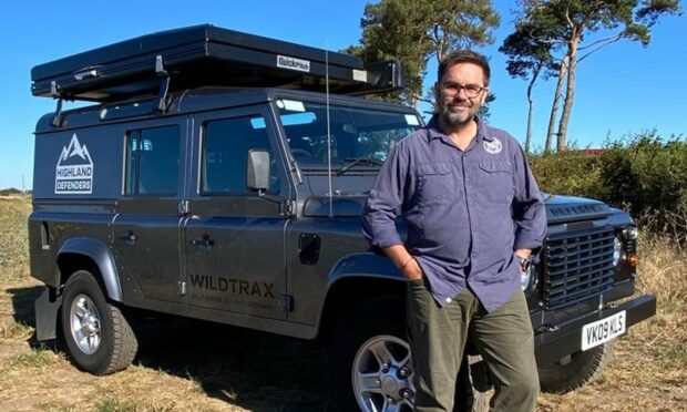 Craig Duttin, general manager, WildTrax, with one of the firm's adventure Land Rovers.