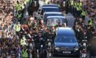 King Charles III and members of the Royal Family join the procession of Queen Elizabeth's coffin yesterday. Picture by Andrew Milligan / PA Wire.
