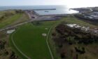 Arial view of Port of Aberdeen south harbour and St Fittick's Park.