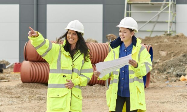 From left, Claire Bathgate, head of sales, and construction manager Katy Green from Dandara Aberdeen at the launch of building work on the third phase of industrial units at City South.