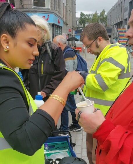 Labour councillor Deena Tissera volunteering with Aberdeen foodbanks.