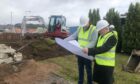 Archway board member, Kenny Simpson and Archway chairman, Jim Sangster inspects the plans. Picture supplied by Archway.