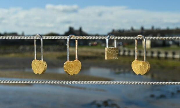 Padlocks on Lossiemouth East Beach Bridge. Pictures by Jason Hedges.