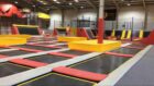 What Jumpstation trampoline park mockup showing trampolines next to each other.