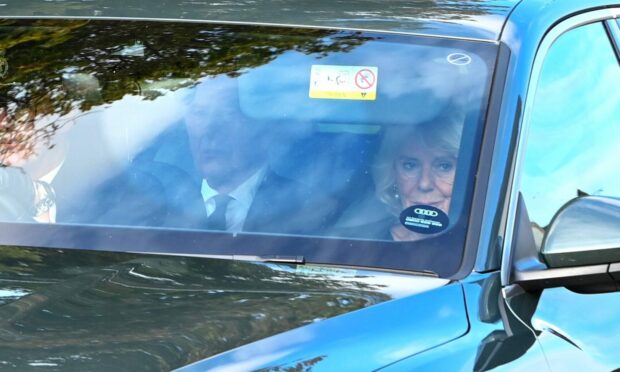 King Charles is pictured driving through Ballater following the Queen's funeral. Picture by Kenny Elrick/ DC Thomson.