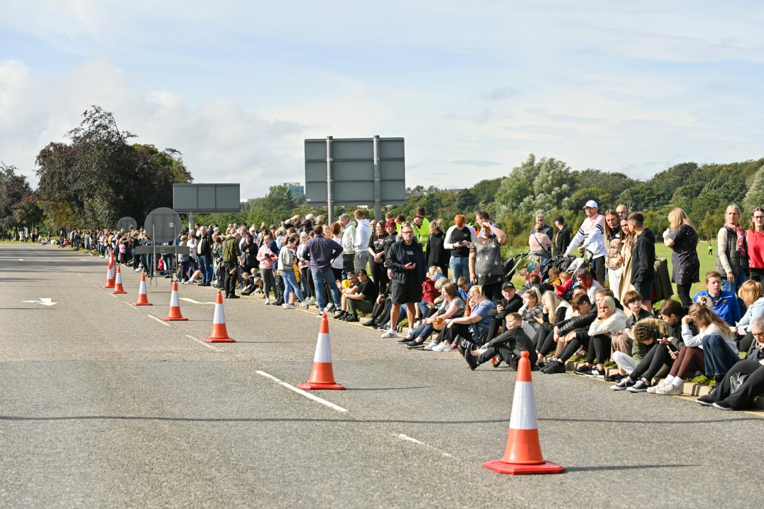 Onlookers gather on Great Southern Road on the south of the River Dee to see the Queen's cortege leave Aberdeen. Picture by Kath Flannery/DCT Media.