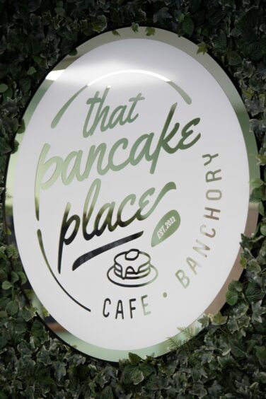A sign that reads "This Pancake Place-cafe-banchory"