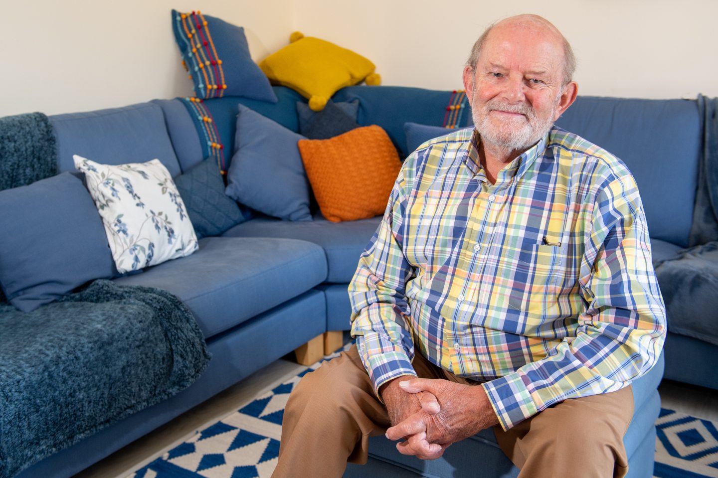 Geoff in his living room. He's been speaking about the impact of osteoporosis on men