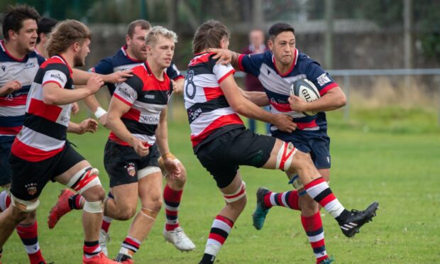 Aberdeen Grammar's Youssef Salem in action against Stirling County. Image by Kami Thomson/DC Thomson