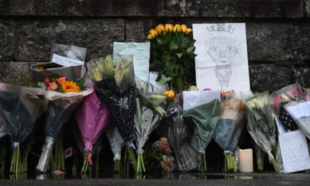 Floral tributes left at Balmoral. Picture by Kami Thomson.