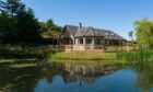Fancy your own loch? Lochside Lodge comes with its very own loch.